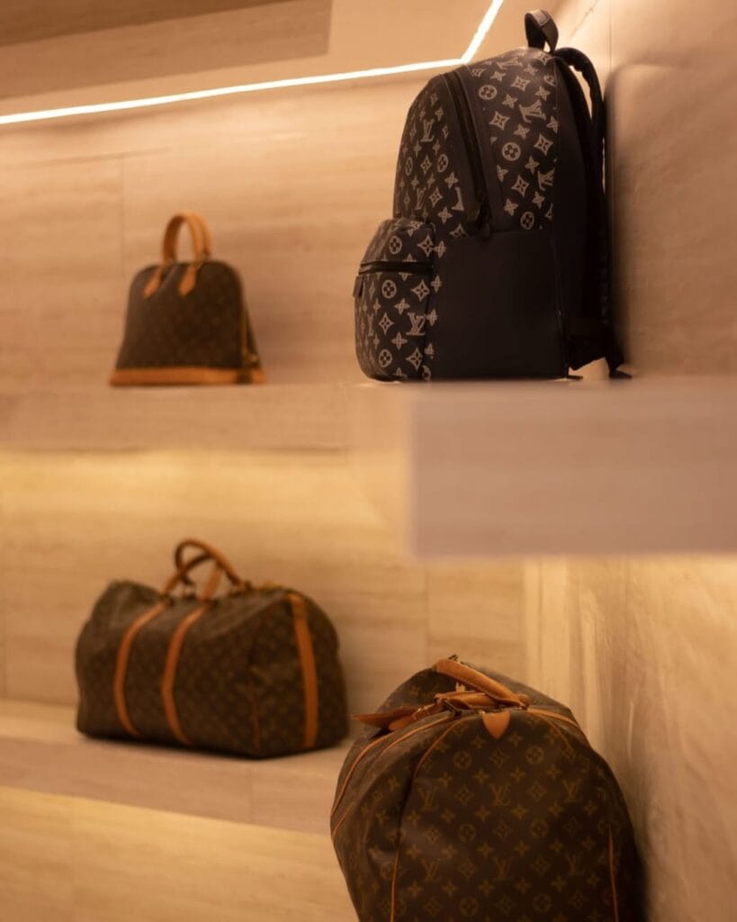 Louis Vuitton bags on a shelf