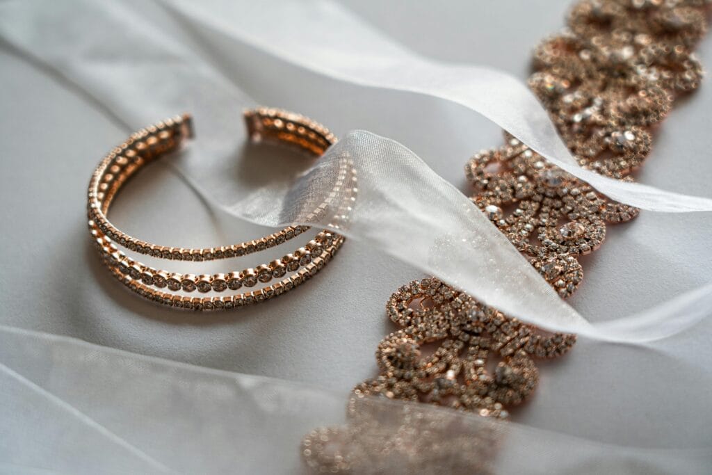 Jewellery a gold necklace and a gold bracelet
